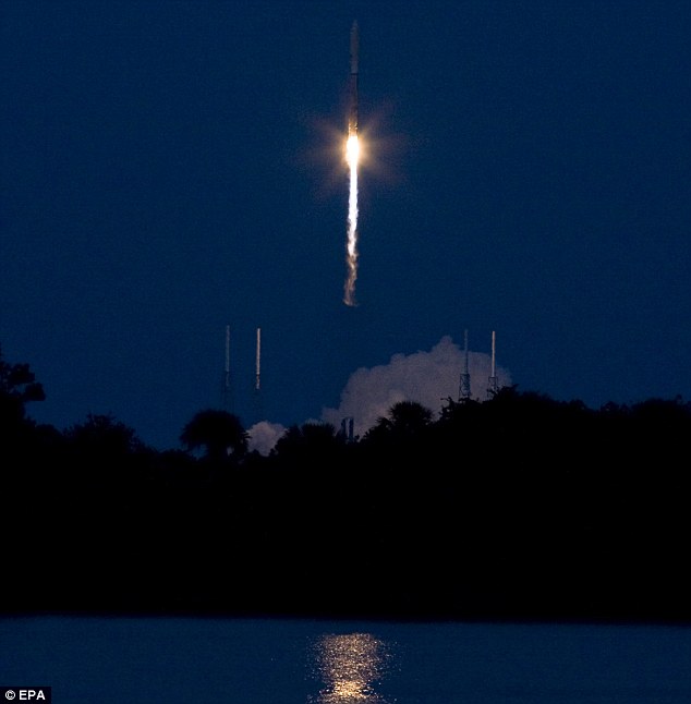 The X-37B sits on top of an Atlas V rocket as it's launched at Cape Canaveral Air Force Station in Florida